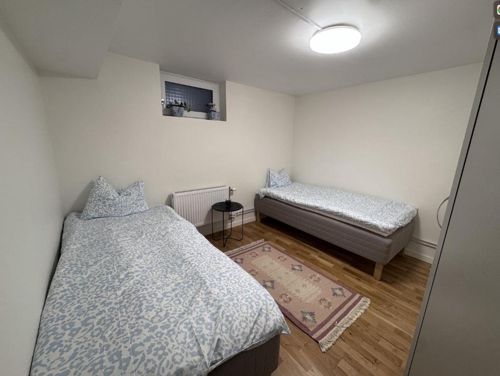 Postel nebo postele na pokoji v ubytování Entire Apartment 20 sqm Modern & Free Parking