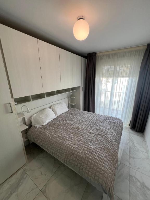 Postel nebo postele na pokoji v ubytování ALKA Luxury Penthouse Unit 11