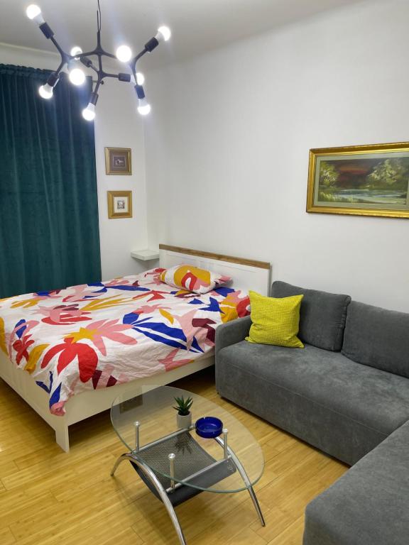 Postel nebo postele na pokoji v ubytování Apartman CENTAR 5