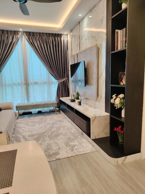 TV a/nebo společenská místnost v ubytování D&Q METROCITY GUESTHOUSE