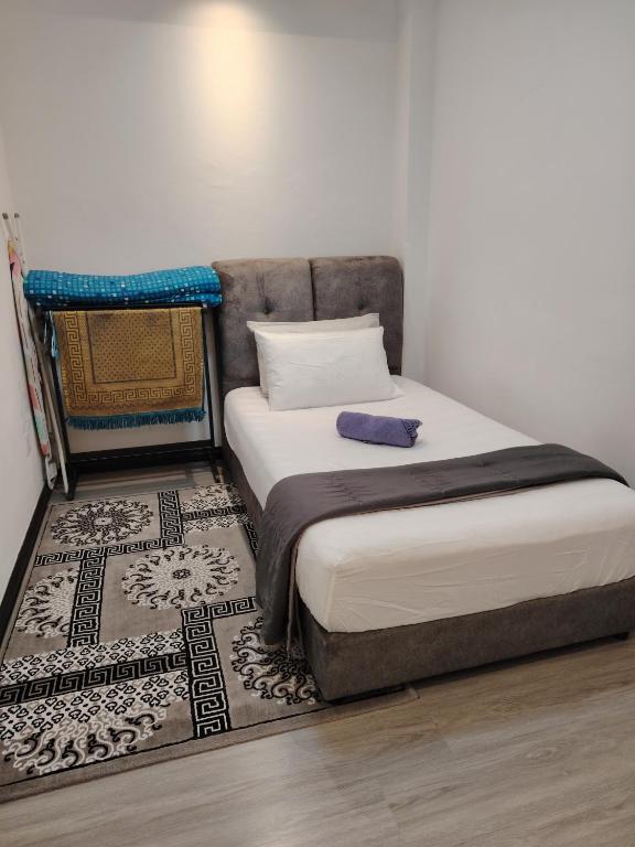Postel nebo postele na pokoji v ubytování D&Q METROCITY GUESTHOUSE