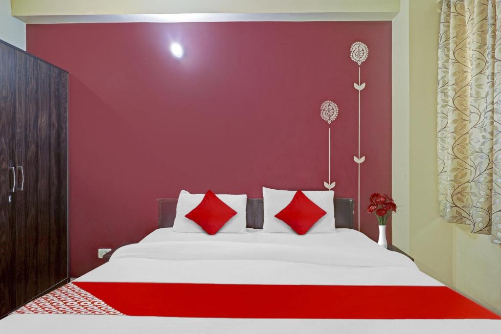 Postel nebo postele na pokoji v ubytování Hotel O A.k Palace