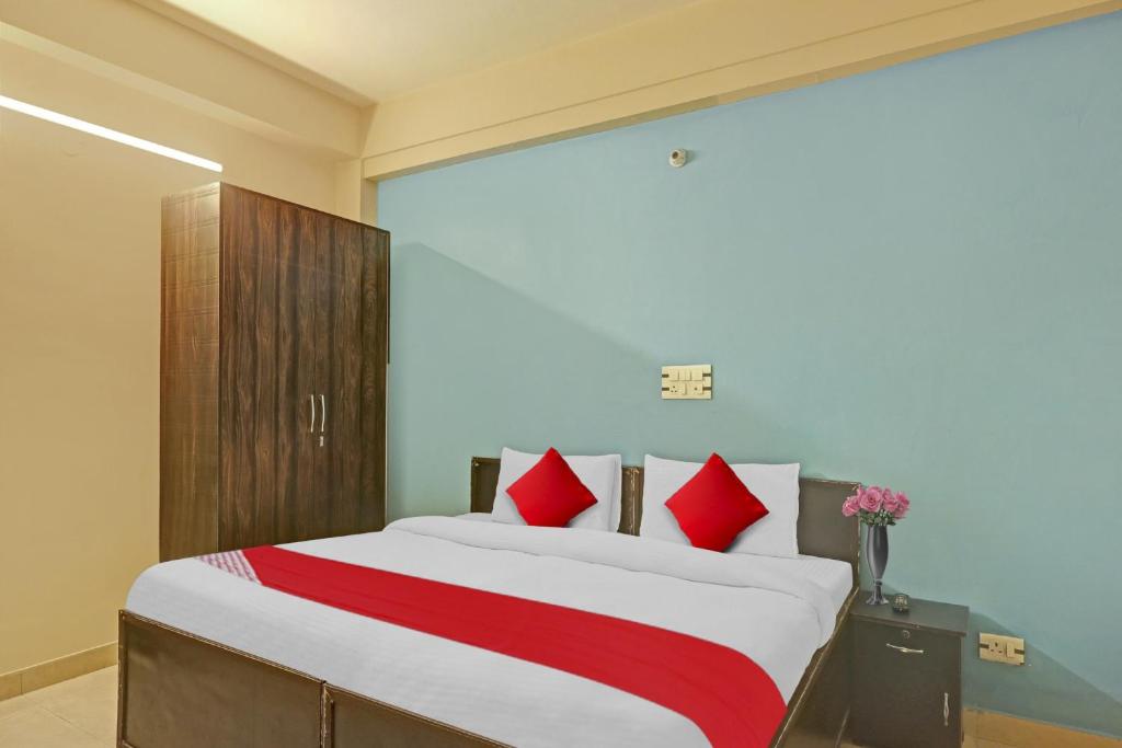 Postel nebo postele na pokoji v ubytování Hotel O A.k Palace