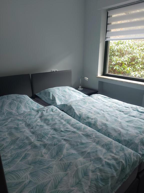 Postel nebo postele na pokoji v ubytování Ferienwohnung Haus Ilse