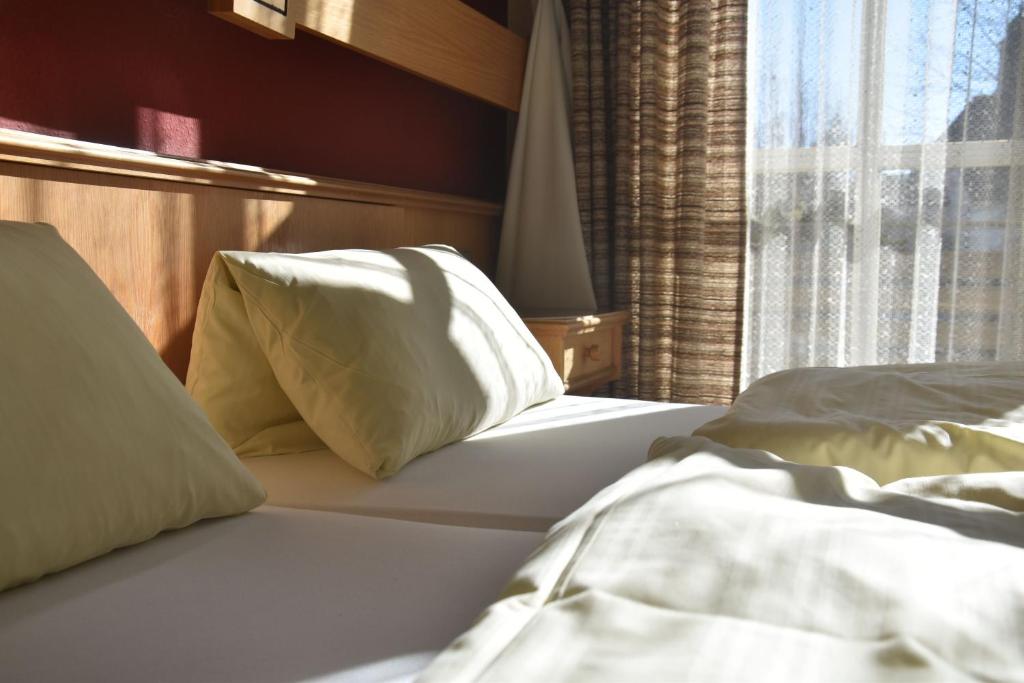 Postel nebo postele na pokoji v ubytování Scheffel - Gasthof