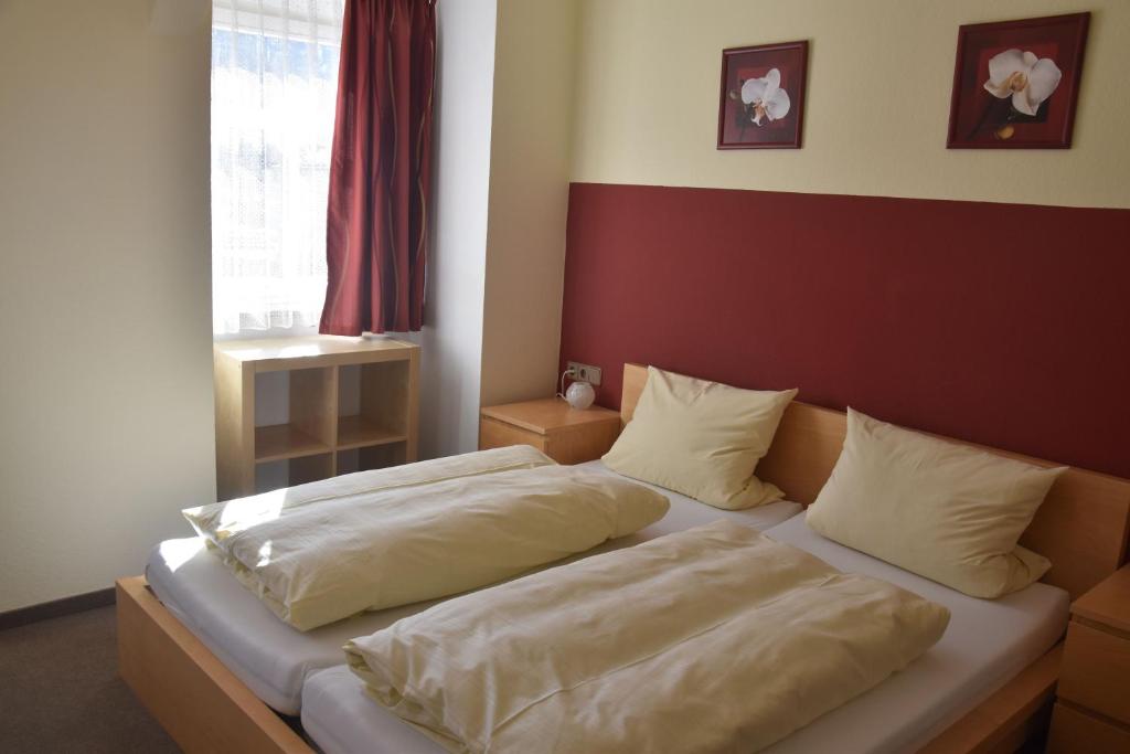 Postel nebo postele na pokoji v ubytování Scheffel - Gasthof