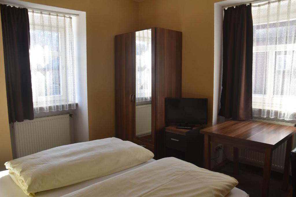 Postel nebo postele na pokoji v ubytování Scheffel - Gasthof