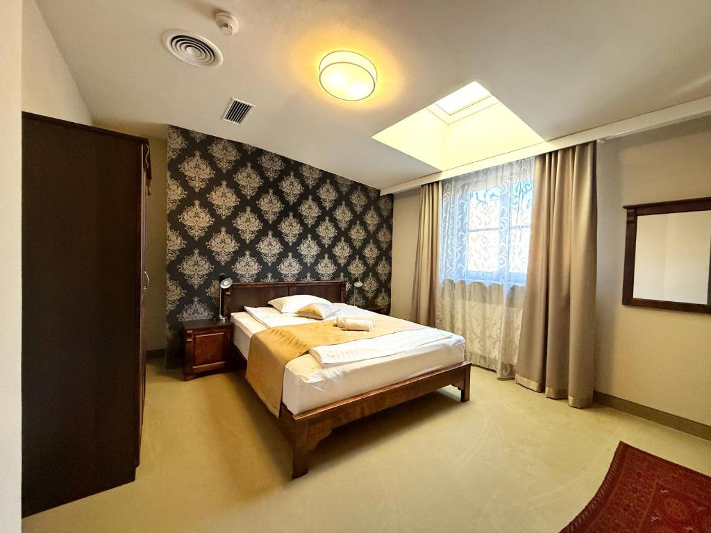 Posteľ alebo postele v izbe v ubytovaní Residence 9