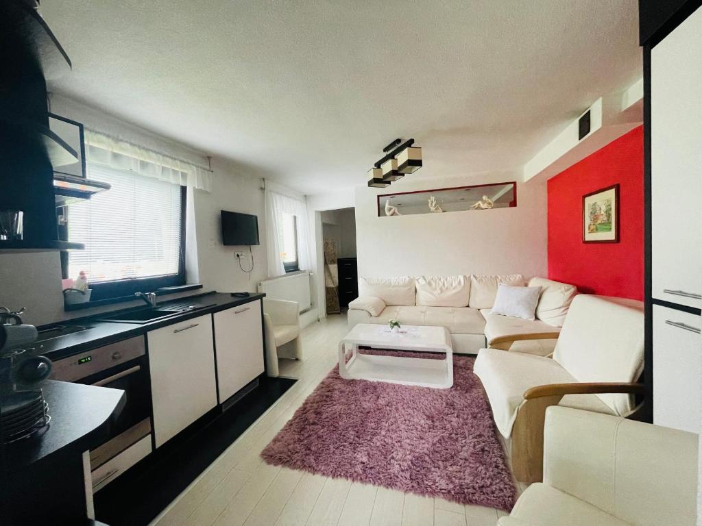 Kuchyňa alebo kuchynka v ubytovaní Apartmany pod Troma Korunami