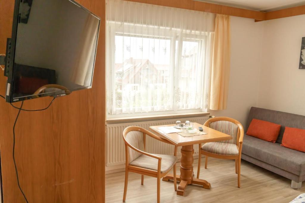 TV a/nebo společenská místnost v ubytování Gasthaus Anker