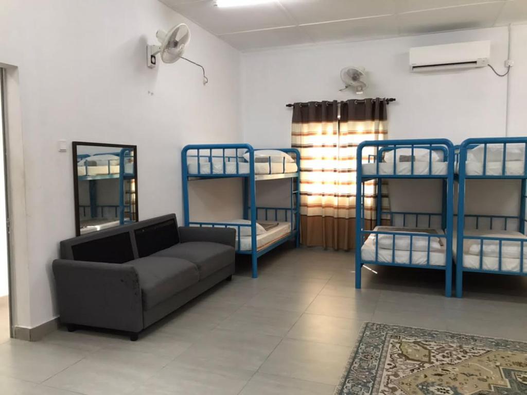 Postel nebo postele na pokoji v ubytování As Sufi Villa