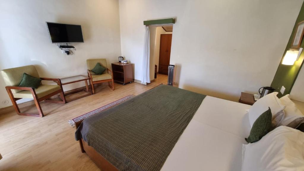 TV a/nebo společenská místnost v ubytování Hotel Padmini NIvas