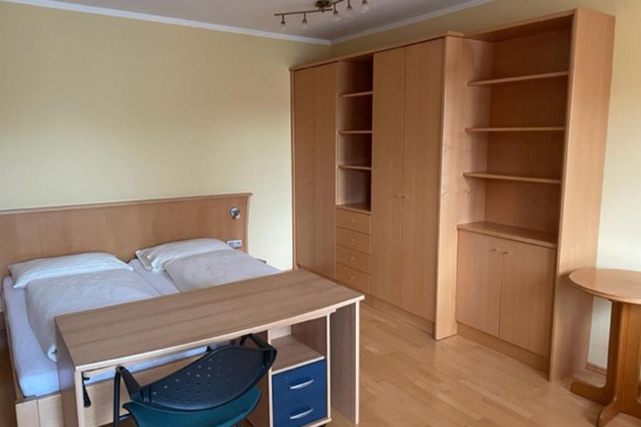 Postel nebo postele na pokoji v ubytování Gasthof Franzl