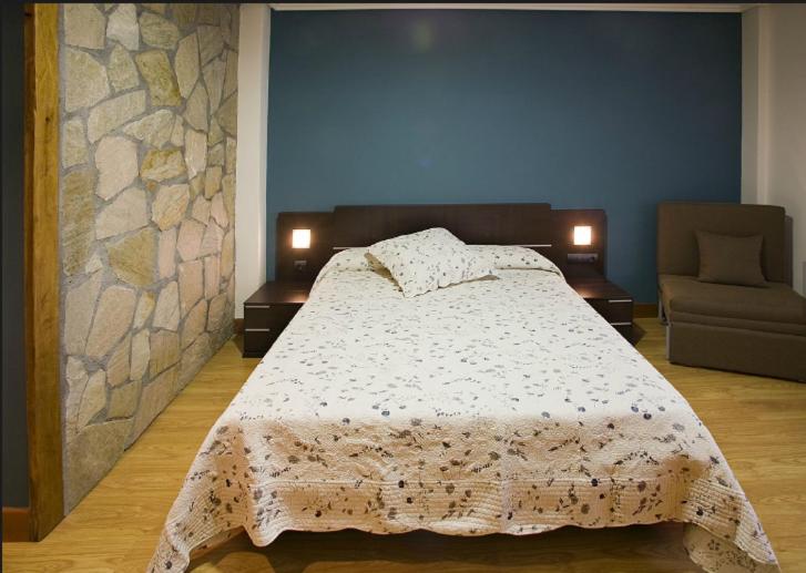 Postel nebo postele na pokoji v ubytování Madarian