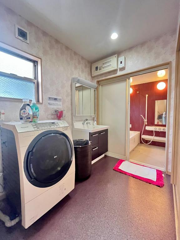 Postel nebo postele na pokoji v ubytování U&T House