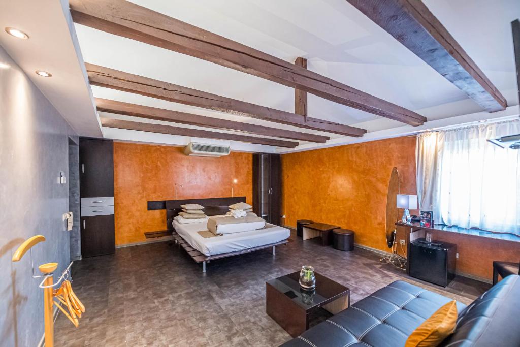 Postel nebo postele na pokoji v ubytování Do Stil Boutique Hotel