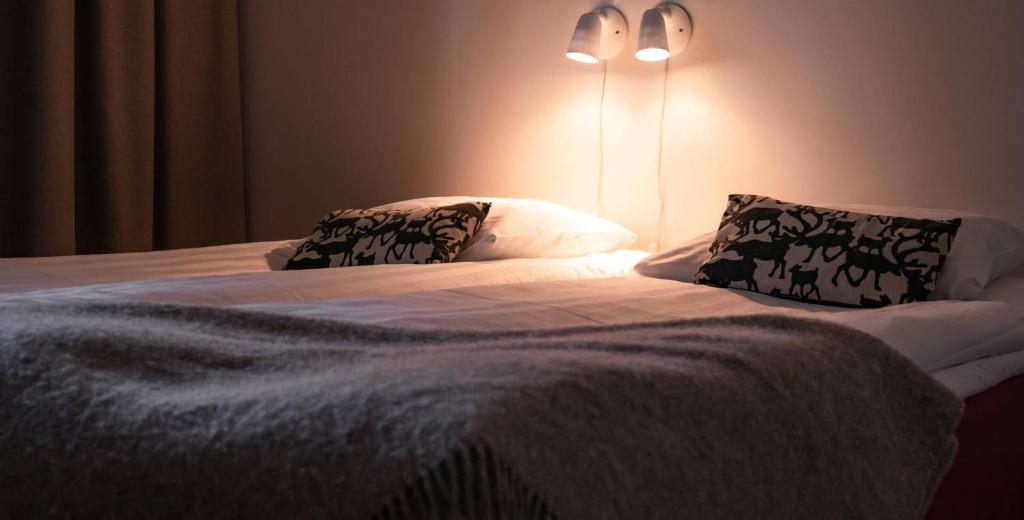 Postel nebo postele na pokoji v ubytování Lapland Hotels Hetta
