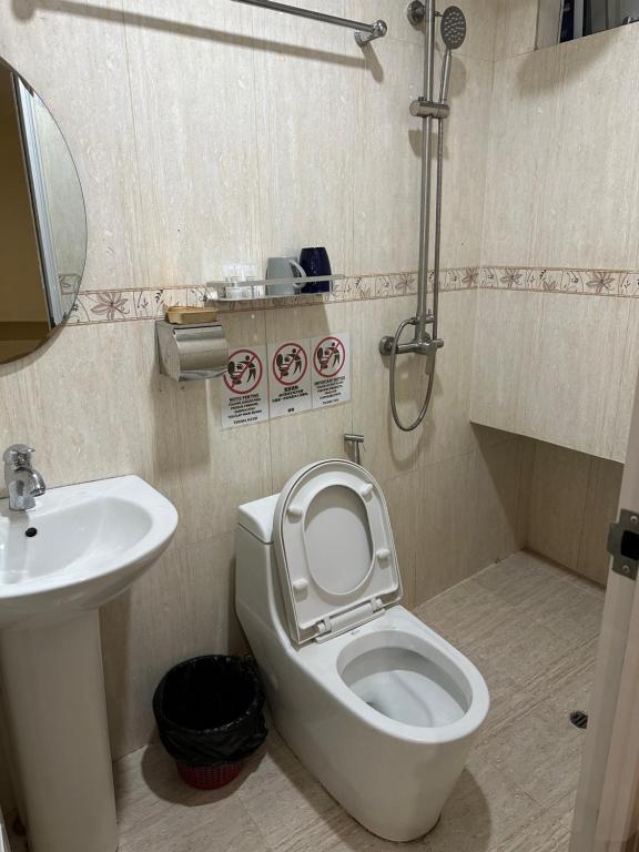 Koupelna v ubytování HK Inn Hua Kiew Inn