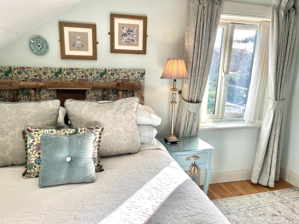 Ένα ή περισσότερα κρεβάτια σε δωμάτιο στο The Artist Residence Dublin Boutique B&B