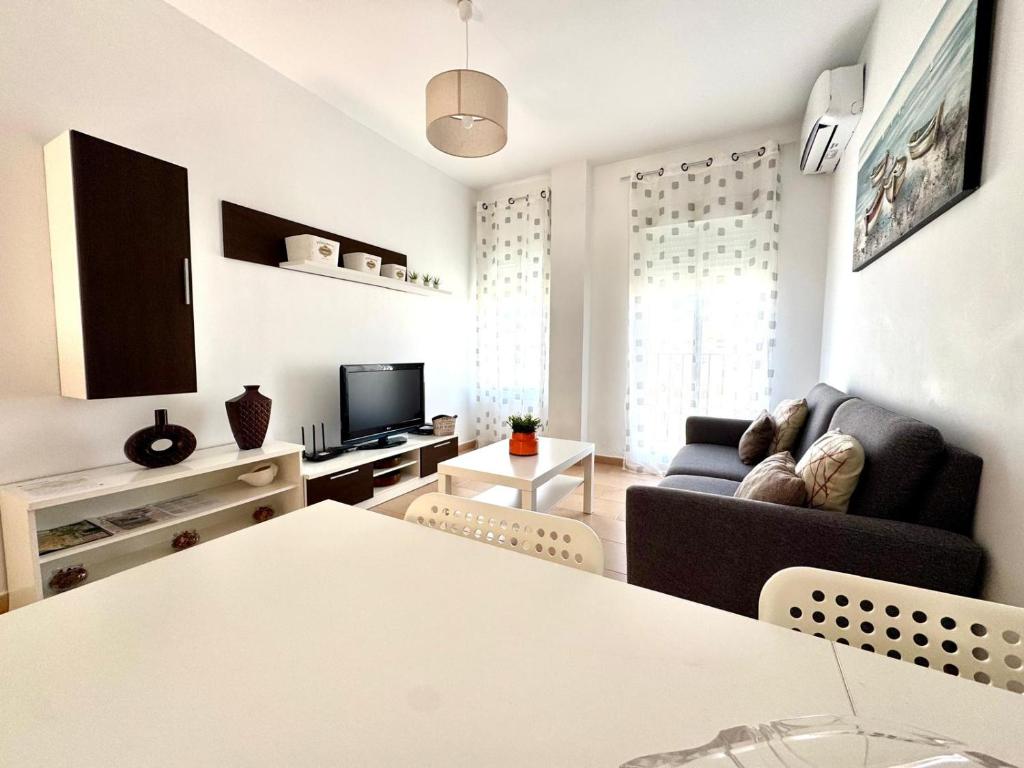 Televízia a/alebo spoločenská miestnosť v ubytovaní Mirador de Doñana Nº8, Apartamentos Living Sur