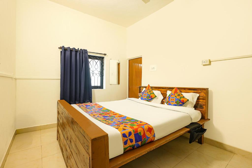 Postel nebo postele na pokoji v ubytování FabExpress Horizon Hideaway - Nr Anjuna Beach