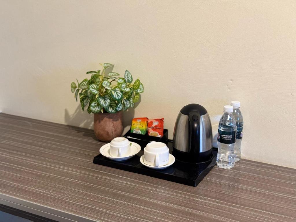 Příslušenství pro přípravu čaje a kávy v ubytování K Garden Hotel (BS)