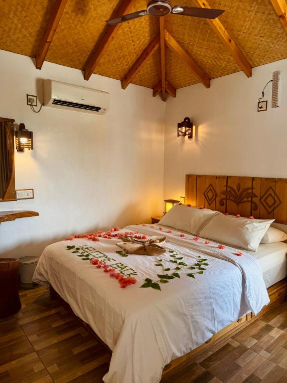 Postel nebo postele na pokoji v ubytování Ameera Maldives