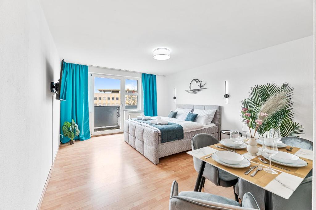 Postel nebo postele na pokoji v ubytování COZY stilvolles Apartment, Nähe BASF, BG Klinik