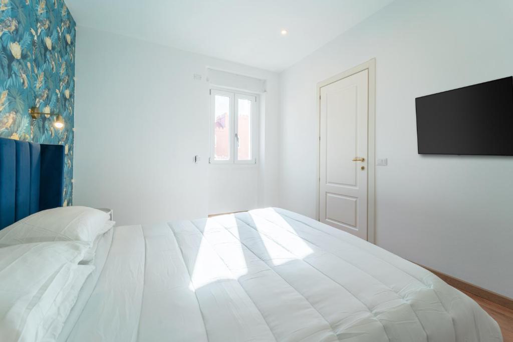 Postel nebo postele na pokoji v ubytování Zuli's Rooms