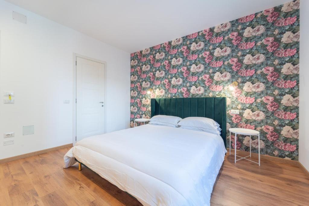 Postel nebo postele na pokoji v ubytování Zuli's Rooms