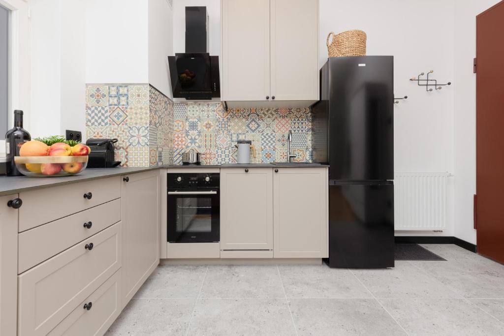 Kuchyňa alebo kuchynka v ubytovaní Praga Duplex Apartment Premium Warsaw by Renters Prestige