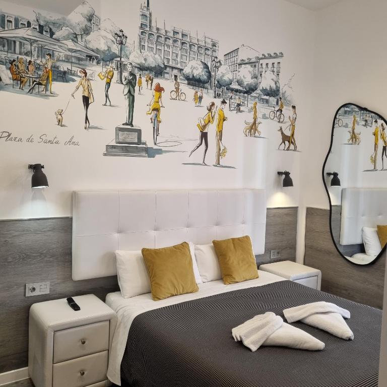Postel nebo postele na pokoji v ubytování Hostal Lauria