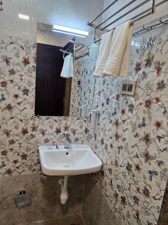 Koupelna v ubytování Hotel Itagi Square Vijapura