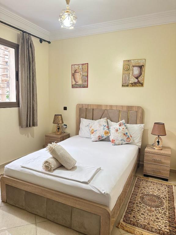 Postel nebo postele na pokoji v ubytování charming room close to Marrakech airport