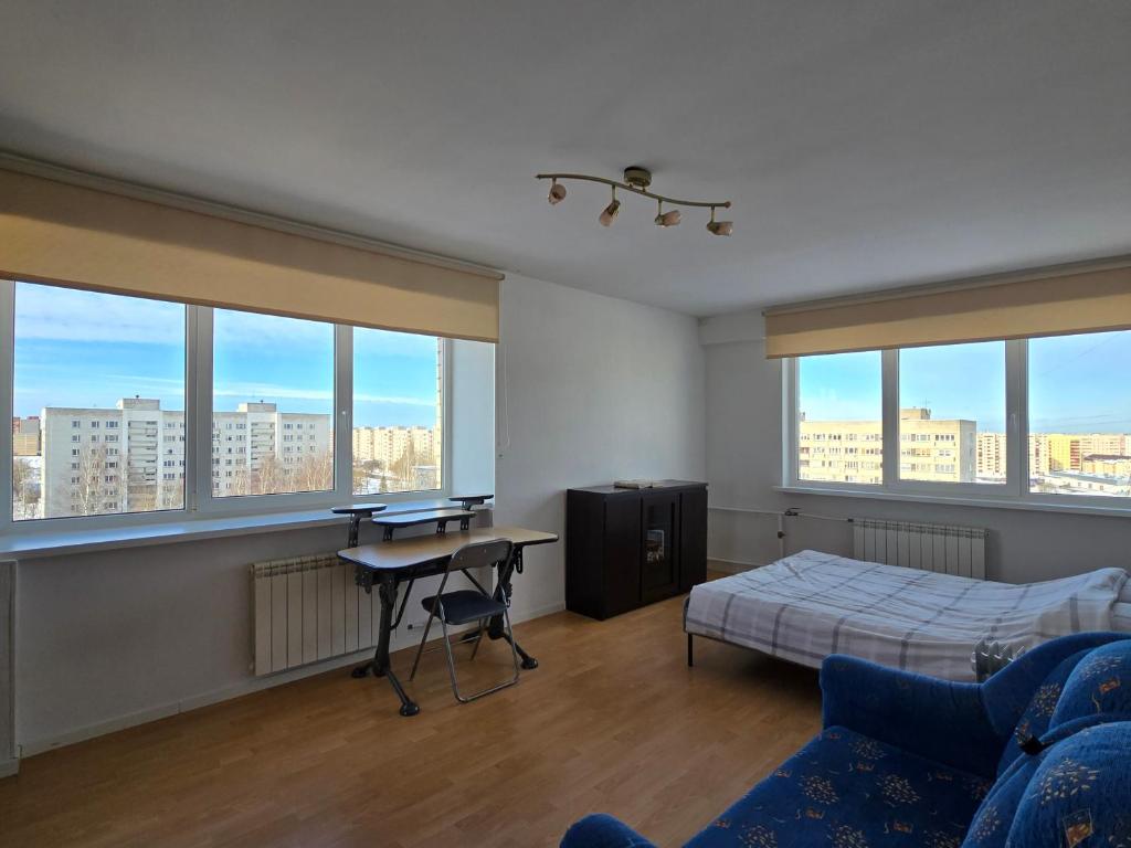 Postel nebo postele na pokoji v ubytování Hero Avenue Apartment