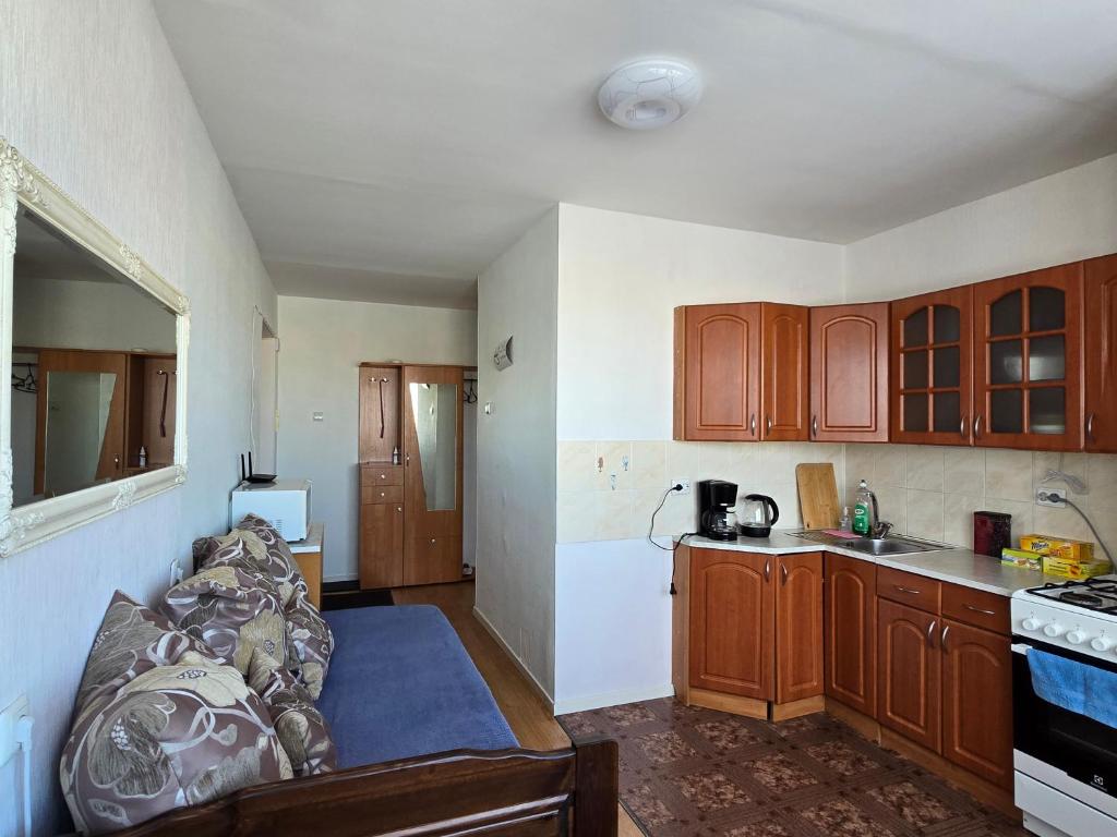 Kuchyň nebo kuchyňský kout v ubytování Hero Avenue Apartment