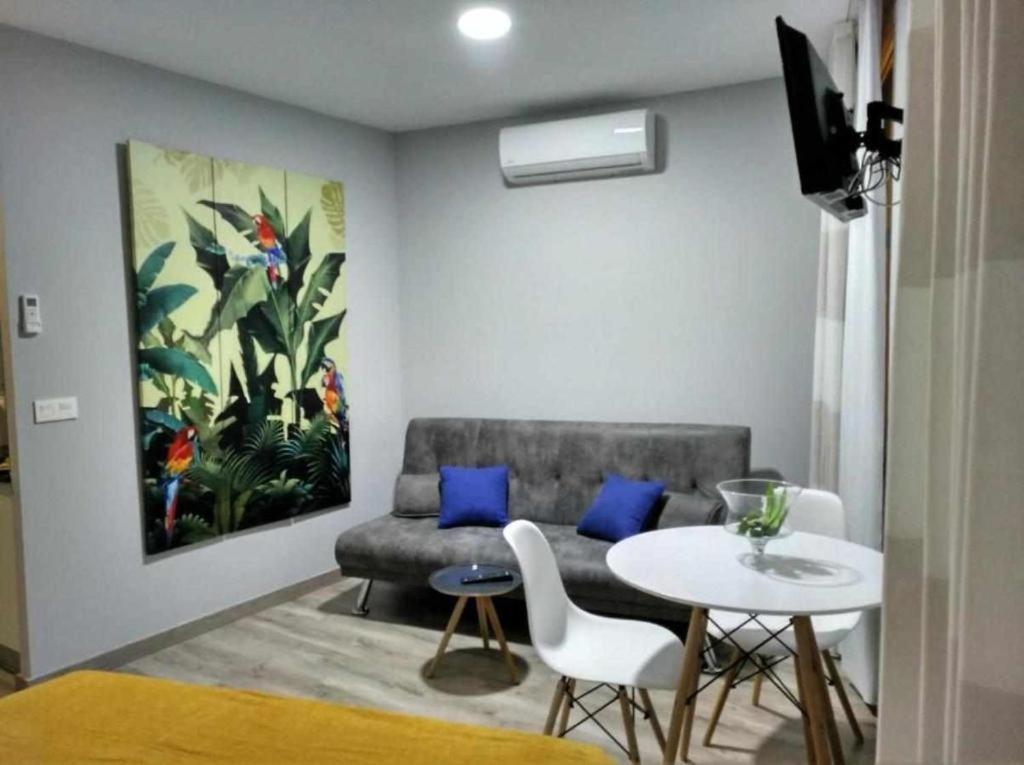 Posedenie v ubytovaní Apartamentos Harmonia