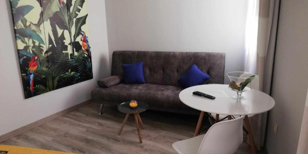 Posedenie v ubytovaní Apartamentos Harmonia