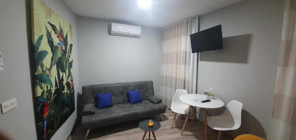 Posedenie v ubytovaní Apartamentos Harmonia