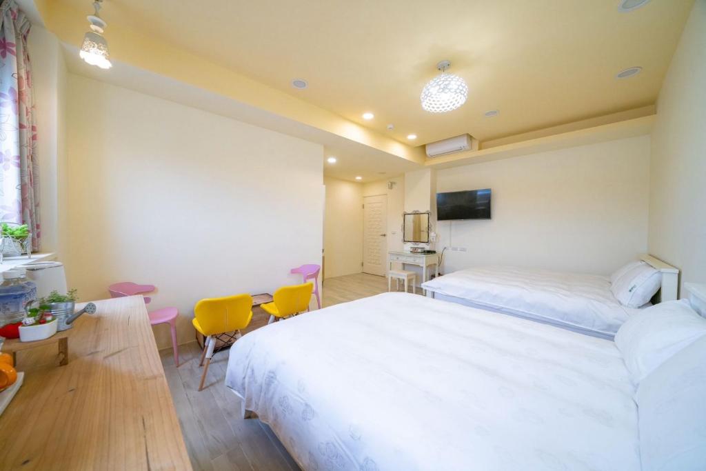 Postel nebo postele na pokoji v ubytování 兆億申襄采民宿1741 Zhao Yì Shen Xiang Cai Homestay 1741