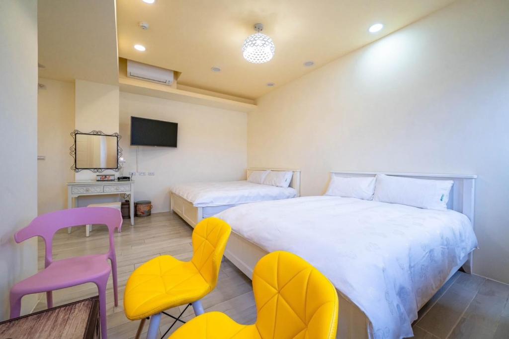 Postel nebo postele na pokoji v ubytování 兆億申襄采民宿1741 Zhao Yì Shen Xiang Cai Homestay 1741