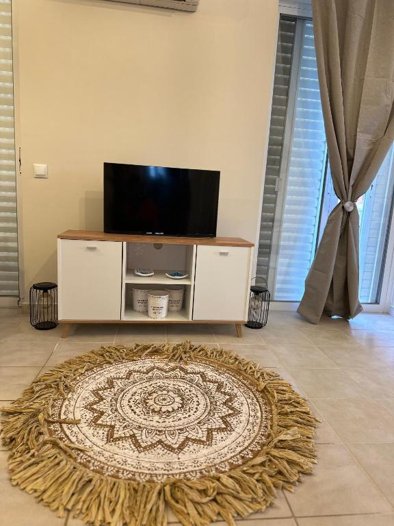 TV a/nebo společenská místnost v ubytování Bella Elena 1