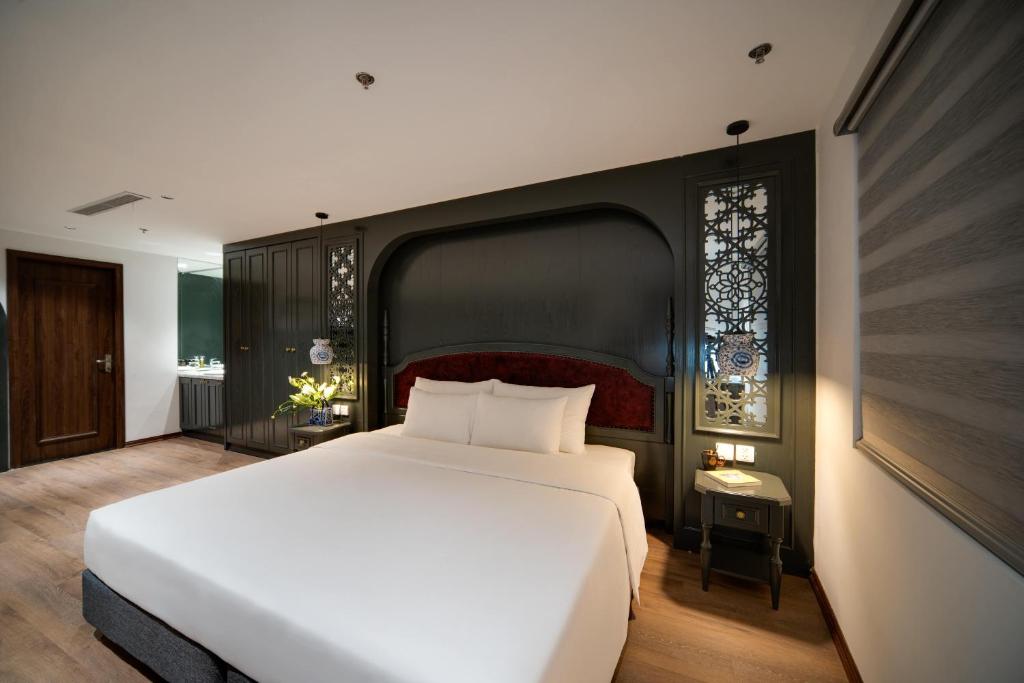 Postel nebo postele na pokoji v ubytování Eli Rina Hotel