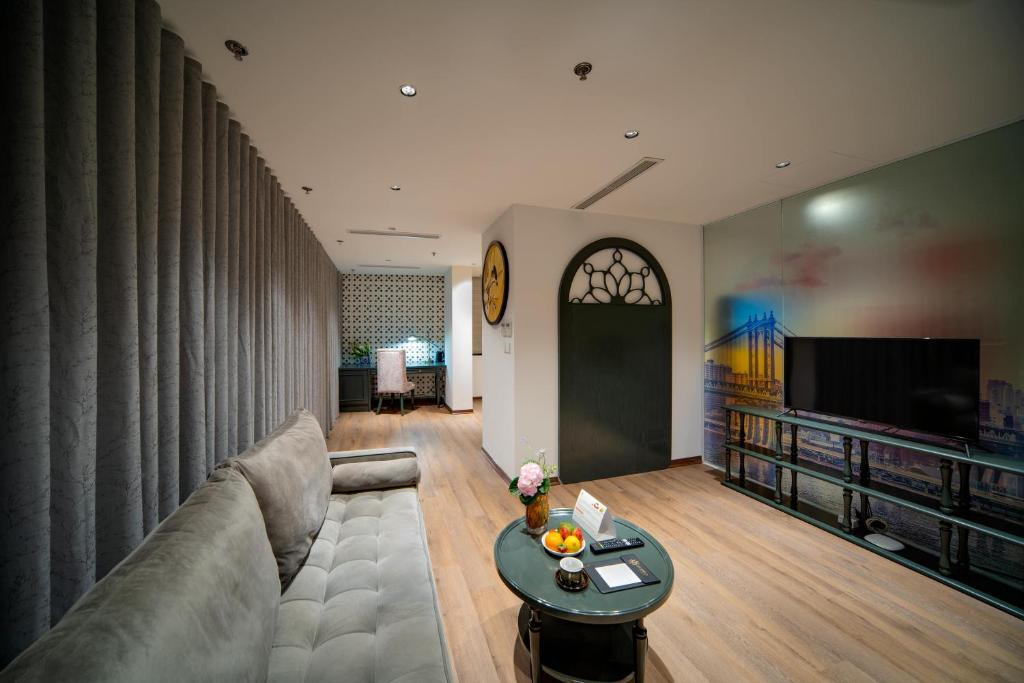 TV a/nebo společenská místnost v ubytování Eli Rina Hotel