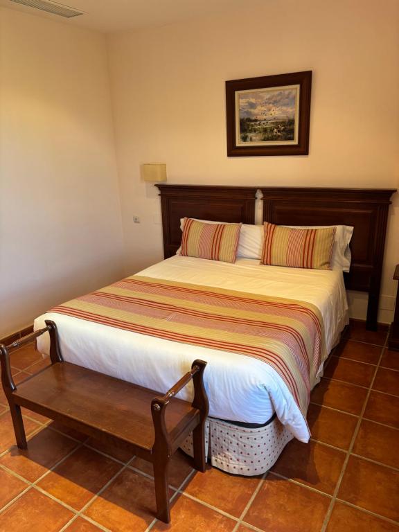 Postel nebo postele na pokoji v ubytování Hotel Rural Carlos Astorga