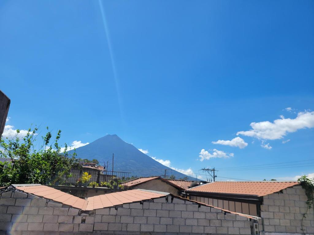 a view of a mountain in the distance at Pacífico Jaguar Antigua in Antigua Guatemala