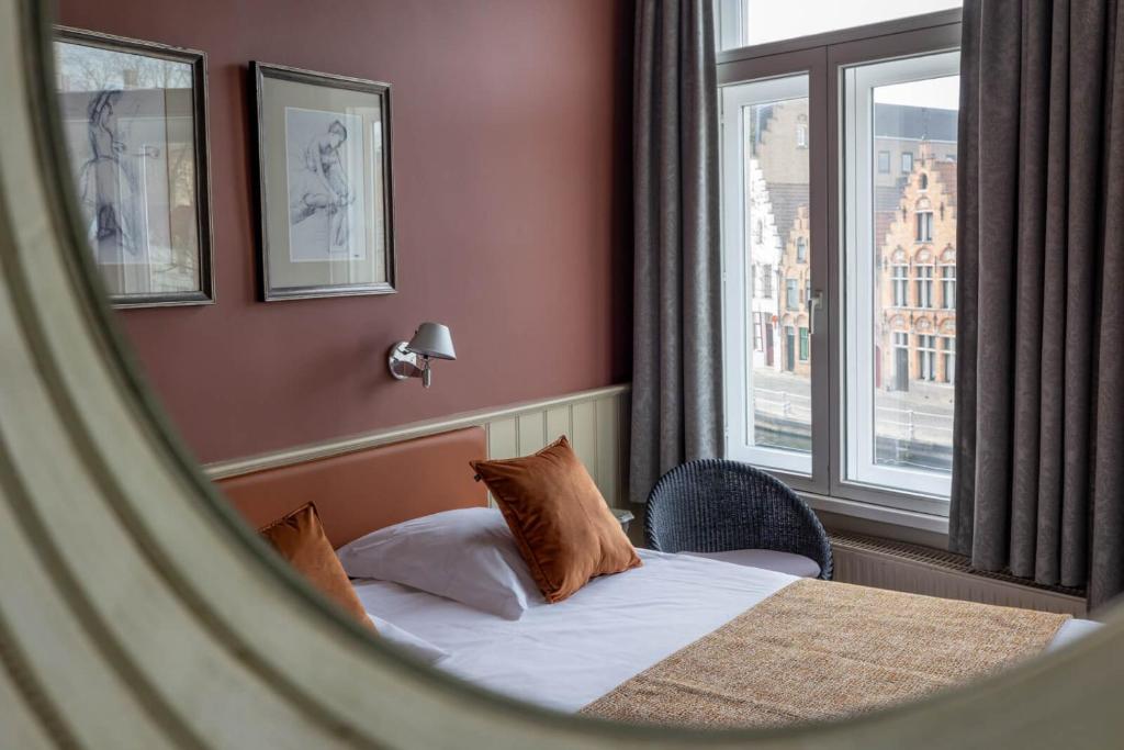 Postel nebo postele na pokoji v ubytování Hotel Ter Duinen