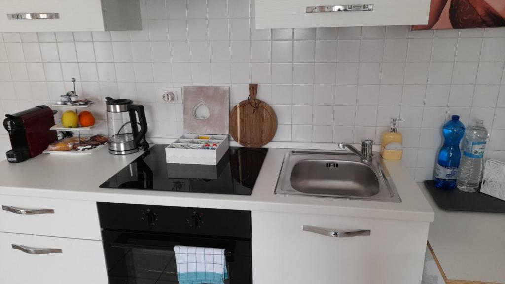 Kuchyň nebo kuchyňský kout v ubytování Casa SAFFI