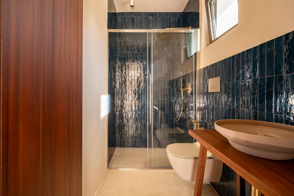 Koupelna v ubytování Botanico Villa & Suites