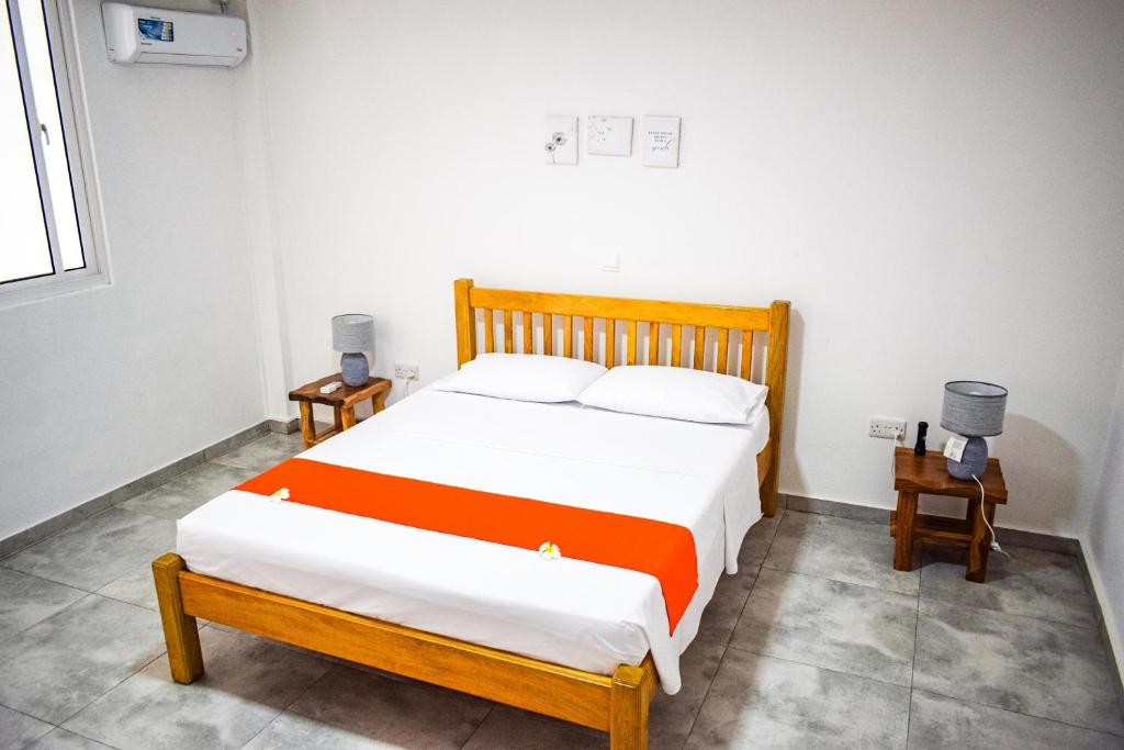 Postel nebo postele na pokoji v ubytování Wild Vanilla Apartment